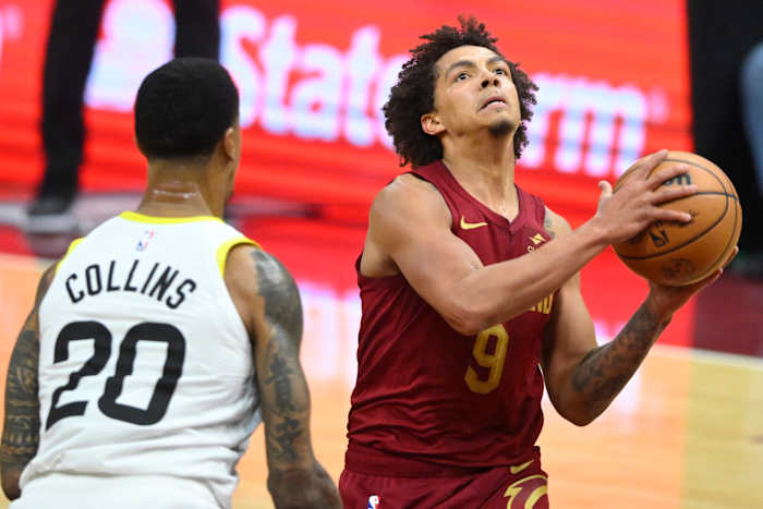 Dec 20, 2023; Cleveland, Ohio, USA; Cleveland Cavaliers guard Craig Porter (9) drives to the basket as Utah Jazz forward John Collins (20) defends in the second quarter at Rocket Mortgage FieldHouse.